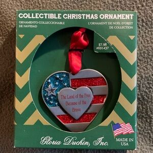 NWT Gloria Duchin Patriotic collectible Christmas ornament. 2 1/2” x 2 1/2”